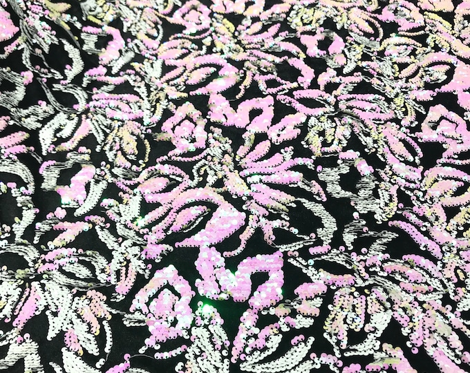 Pink, white iridescent sequins flip two tone floral design on a black stretch velvet, Sold by the yard.