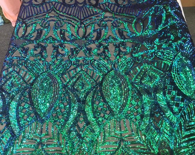 Green royalty iridescent sequins on a 4 way Stretch black mesh lace-dresses-apparel-fashion-prom-nightgown-sold by the yard.