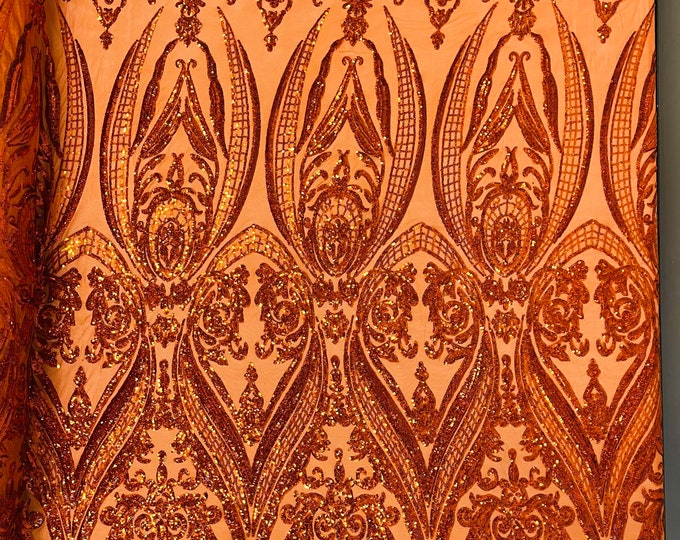 Burnt Orange iridescent empire damask design with sequins embroider on a 4 way stretch mesh fabric-sold by the yard.