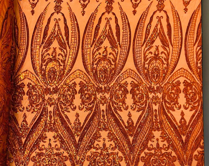 Burnt Orange iridescent empire damask design with sequins embroider on a 4 way stretch mesh fabric-sold by the yard.