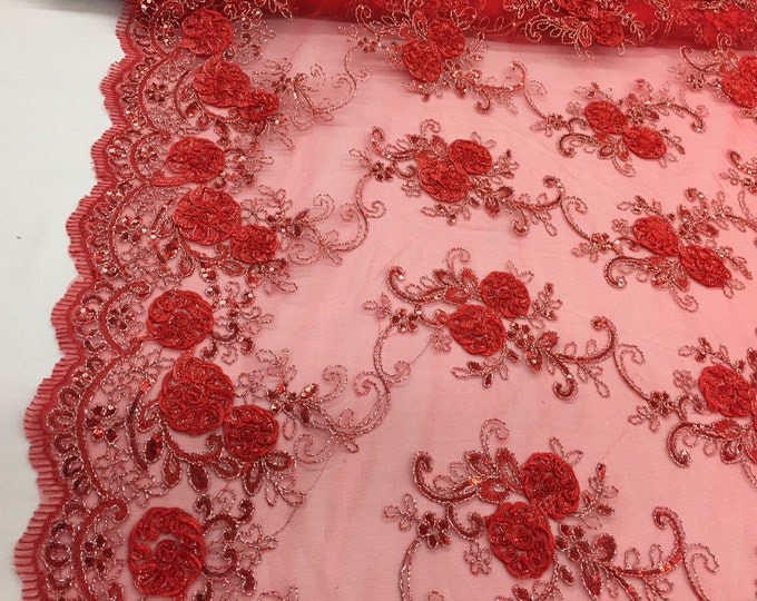 Red/silver 3d flowers embroider with sequins on a red mesh lace. Wedding/bridal/prom/nightgown fabric. Sold by the yard.