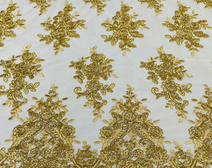 Metallic Gold flower lace corded and embroider with sequins on a mesh-Sold by the yard.