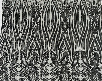 Black sequin design on a 4 way stretch mesh-prom-sold by the yard.