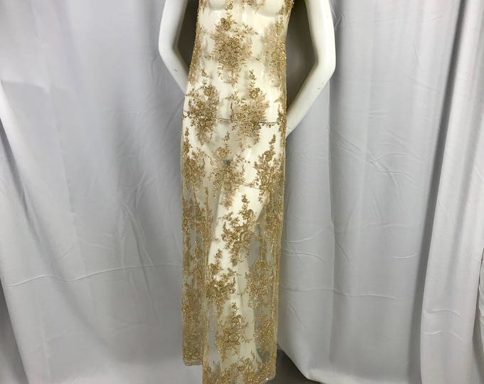 Gold french design embroider and hand beaded on a mesh lace.36x50inches-prom-nightgown-decorations-dresses-Sold by the yard.