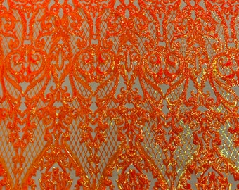 Deluxe damask Neon Orange iridescent sequin design on Nude 4 way stretch mesh fabric-prom-sold by the yard.
