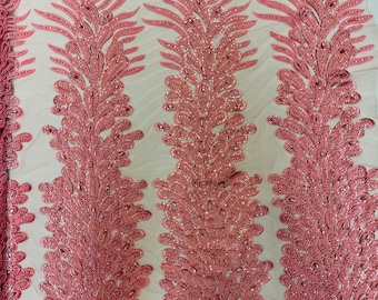 New Vegas heavy beaded feather design embroidery on a mesh fabric-Sold by the panel- Dusty Rose