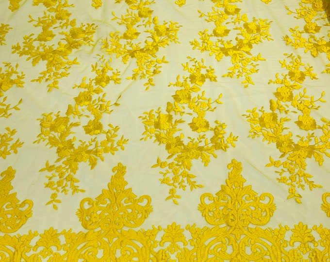 Yellow flowers flat lace embroider on a 2 way stretch mesh sold by the yard.