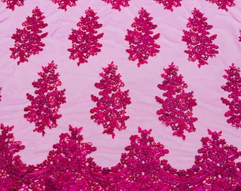 Magenta corded embroider with sequins on a mesh lace fabric-prom-sold by the yard.