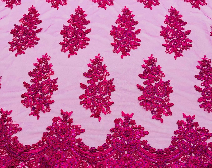 Magenta corded embroider with sequins on a mesh lace fabric-prom-sold by the yard.