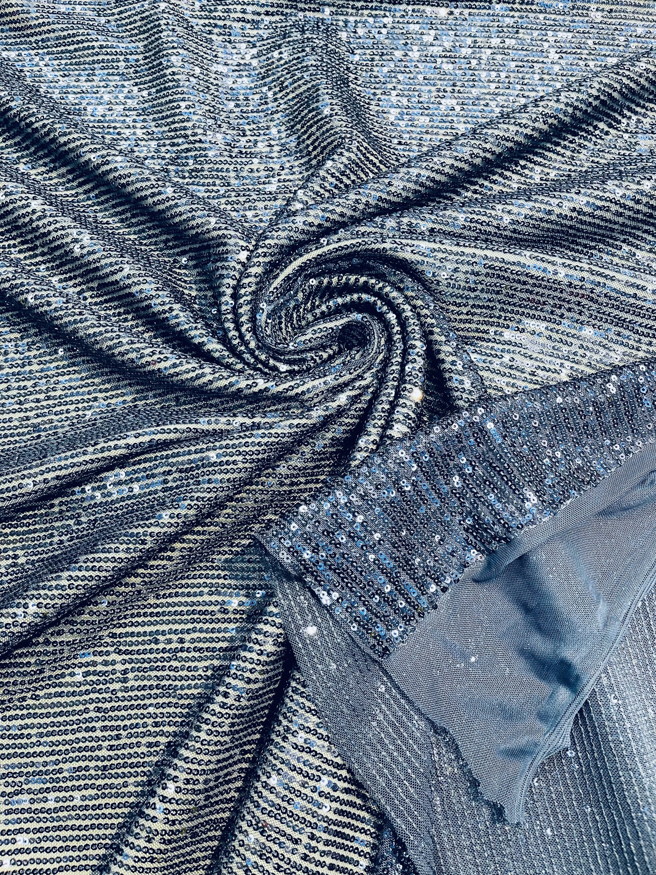 Trousers in shiny coated fabric