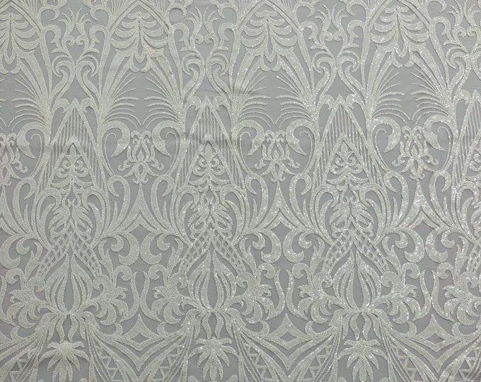 White sequin damask design on a 4 way stretch mesh fabric-prom-sold by the yard.