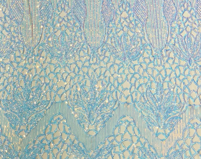 Aqua clear iridescent floral damask sequin design on a Nude 4 way stretch mesh-prom-sold by the yard.