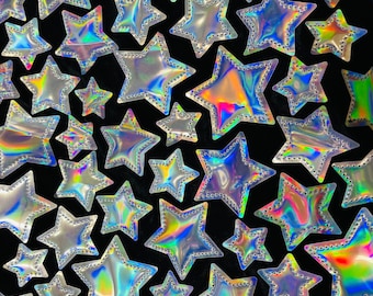 Silver Iridescent sequin Stars On Black Stretch Velvet Fabric Sold By The Yard.