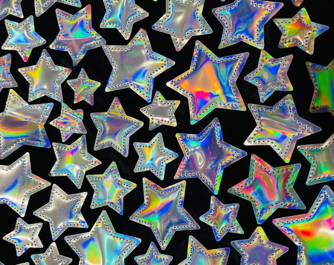 Silver Iridescent sequin Stars On Black Stretch Velvet Fabric Sold By The Yard.