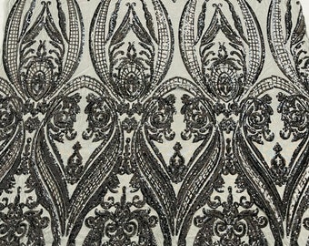 Black empire damask design with sequins embroider on a 4 way stretch mesh fabric-sold by the yard.