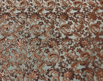 Copper metallic corded embroider flowers with sequins on a mesh lace fabric-prom-sold by the yard.