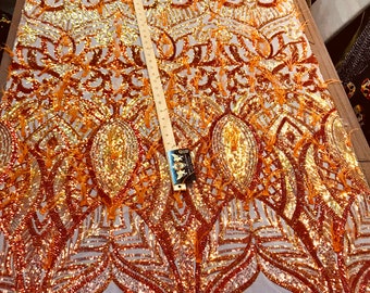 Orange Iridescent Sequins With Feathers On A 4 Way Stretch Nude Mesh Fabric-Prom-Nightgown-Sold By The Yard-Free Shipping In The USA-