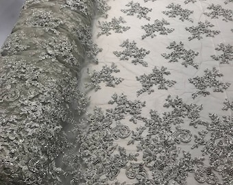 Gray fashion floral design embroider with sequins and hand beaded on a mesh lace-dresses-fashion-nightgown-sold by the yard.