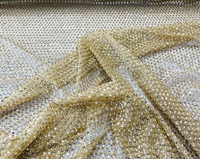 Gold heavy beaded princess design embroider with beads and sequins on a glitter mesh lace-sold by yard.