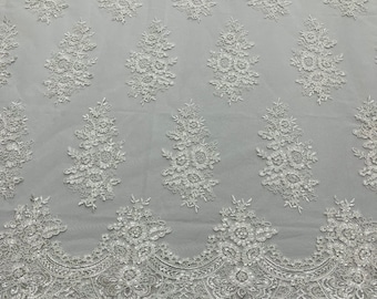 Off White Floral corded embroider with sequins on a mesh lace fabric-prom-sold by the yard.
