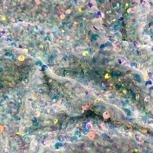 Clear Iridescent On Mint stretch velvet with luxury sequins all over 5mm shining sequins 2-way stretch, sold by the yard.