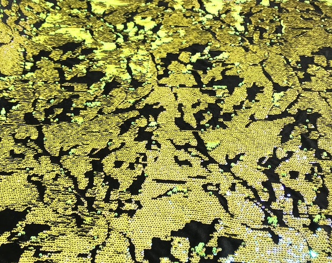 Neon Yellow iridescent sequins flip two tone camouflage  design on a black stretch velvet, Sold by the yard.