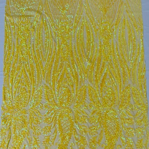 Yellow iridescent Paisley sequin design on a yellow 4 way stretch mesh-prom-sold by the yard.
