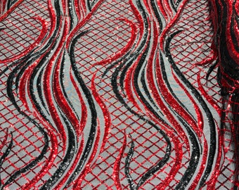 Red/Black sequin flame design on a 4 way stretch Black mesh-sold by the yard.