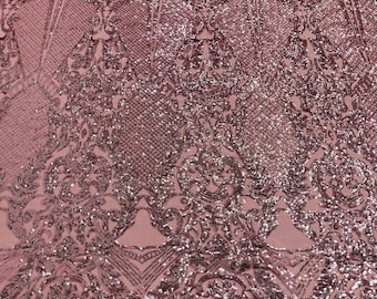 Dusty Rose shiny sequin damask design on a 4 way stretch mesh-sold by the yard.