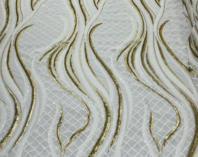 White/Matte Gold sequin flame design on a 4 way stretch white mesh-sold by the yard.