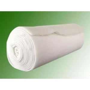 May include: A white roll of batting for quilting or crafting projects.