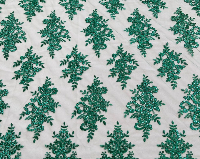 Hunter green flower lace corded and embroider with sequins on a mesh fabric- Sold by the yard.