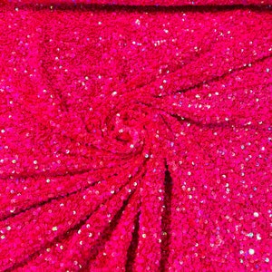 Hot Pink iridescent 5mm sequins on a Hot Pink  stretch velvet 2-way stretch, sold by the yard.