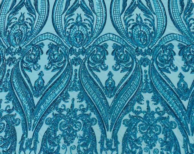 Turquoise hologram empire damask design with sequins embroider on a 4 way stretch mesh fabric-sold by the yard.