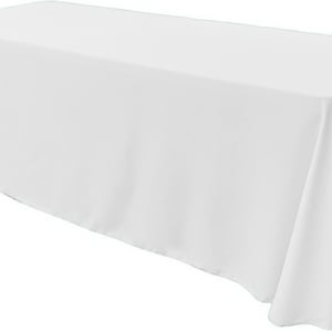 May include: A plain white rectangular tablecloth. The tablecloth is draped over a table and hangs down on all sides.