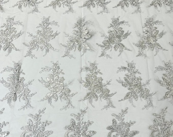 Metallic Silver corded embroider with sequins on a mesh lace fabric-prom-sold by the yard.