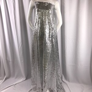 Silver mermaid fish scales-mini sequins embroider on a 2 way stretch mesh fabric-dresses-apparel-fashion-decorations-sold by the yard.