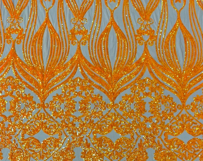 Neón Orange iridescent sequin damask design on a Nude 4 way stretch mesh-sold by the yard.