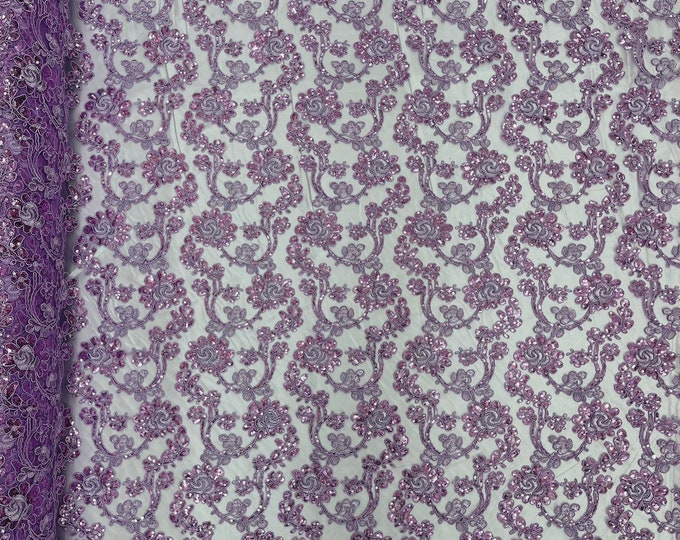 Lilac corded flowers embroider with sequins on a mesh lace fabric-prom-sold by the yard.