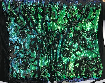 Green iridescent sequins embroider on a black 2 way stretch velvet-apparel-fashion-decorations-dresses-nightgown-sold by the yard.