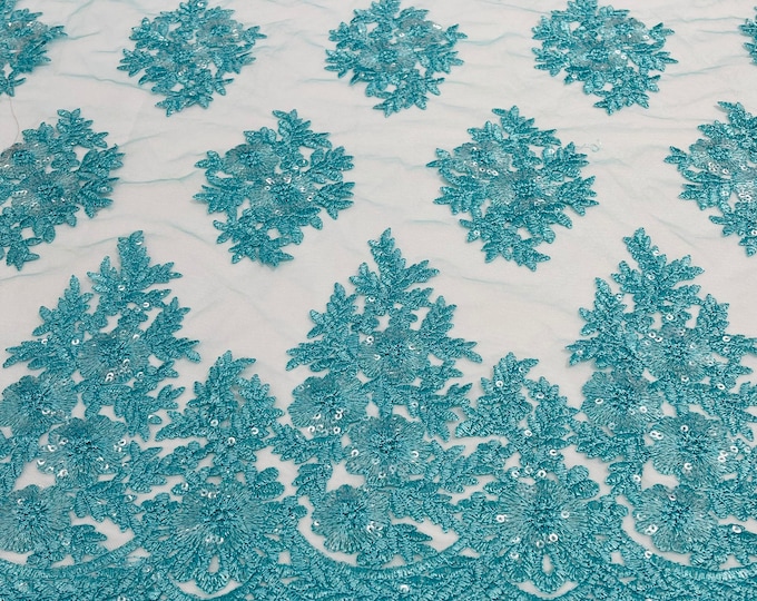 Aqua Floral corded embroider with sequins on a mesh lace fabric-sold by the yard.