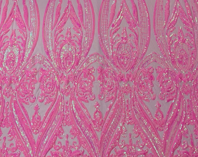 Candy pink iridescent empire design embroider with glossy sequins on a 4 way stretch mesh--sold by the yard.NEW!