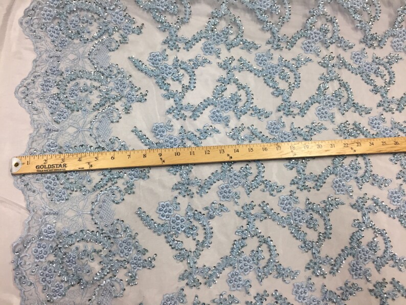 Majestic light Blue Shinny vine design embroider and heavy beading on a mesh lace-prom-nightgown-decorations-dresses-sold by the yard.
