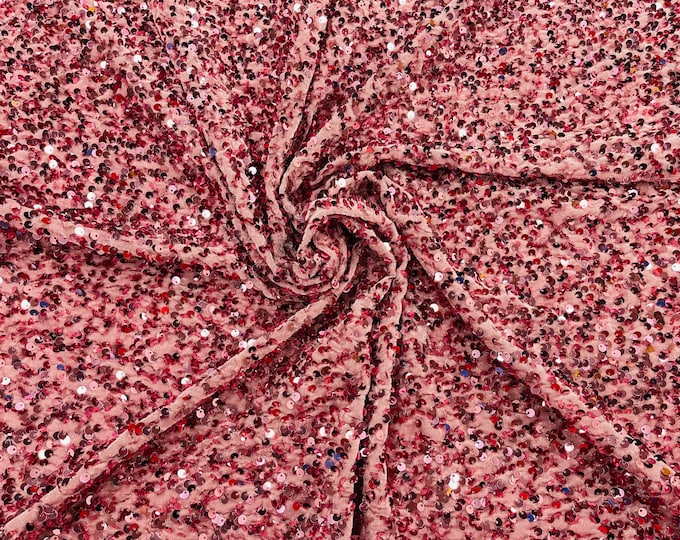 Dusty pink economic all over shiny sequins on a 2 way stretch velvet , sold by the yard.