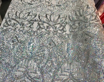 Silver iridescent shiny sequin royalty design embroidery on a 4 way stretch mesh-prom-nightgown-sold by the yard-free shipping in the USA.
