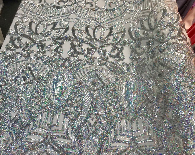 Silver iridescent shiny sequin royalty design embroidery on a 4 way stretch mesh-prom-nightgown-sold by the yard-free shipping in the USA.