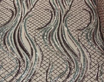 Dusty Pink/Silver sequin flame design on a 4 way stretch Pink mesh-sold by the yard.