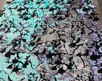 Aqua-white iridescent and reversible sequins embroidery on a 4 way stretch black velvet-dresses-fashion-sold by the yard-free shipping USA.