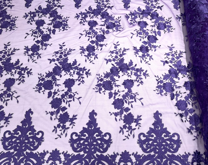 Purple flowers flat lace embroider on a 2 way stretch mesh sold by the yard.