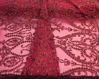 Matte burgundy damask design embroider with sequins on a 2 way stretch mesh-prom-nightgown-decorations-sold by the yard.
